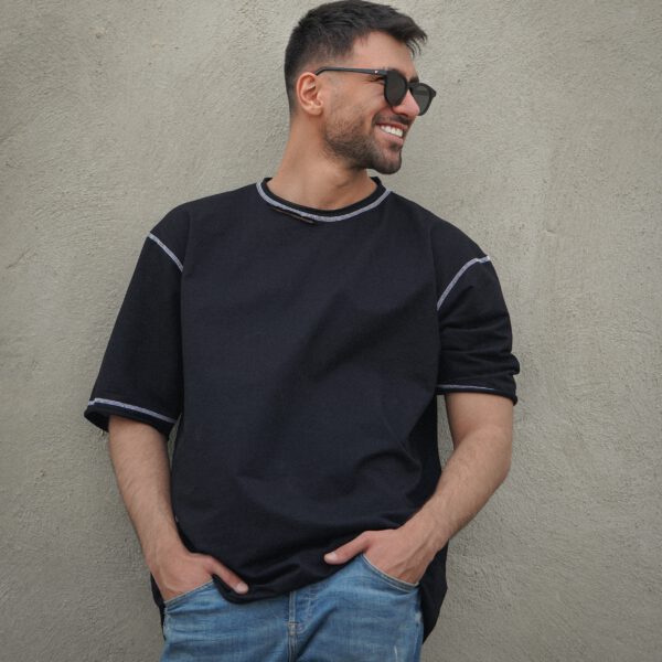 guy infront of a wall